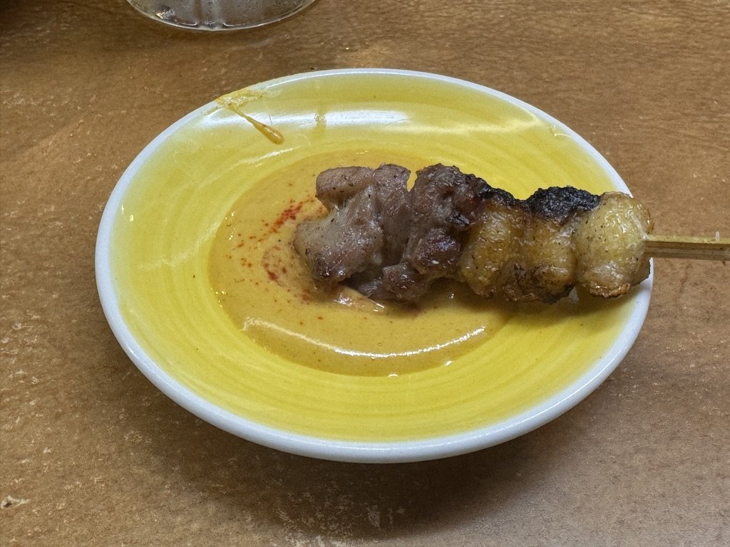 やきとりの名門 秋吉 総曲輪店 純けいをからしと一味につけたところ